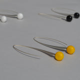 Curved ceramic and silver earrings